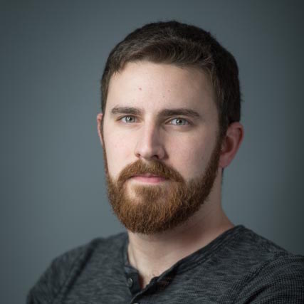 Headshot of Adam Hinkel